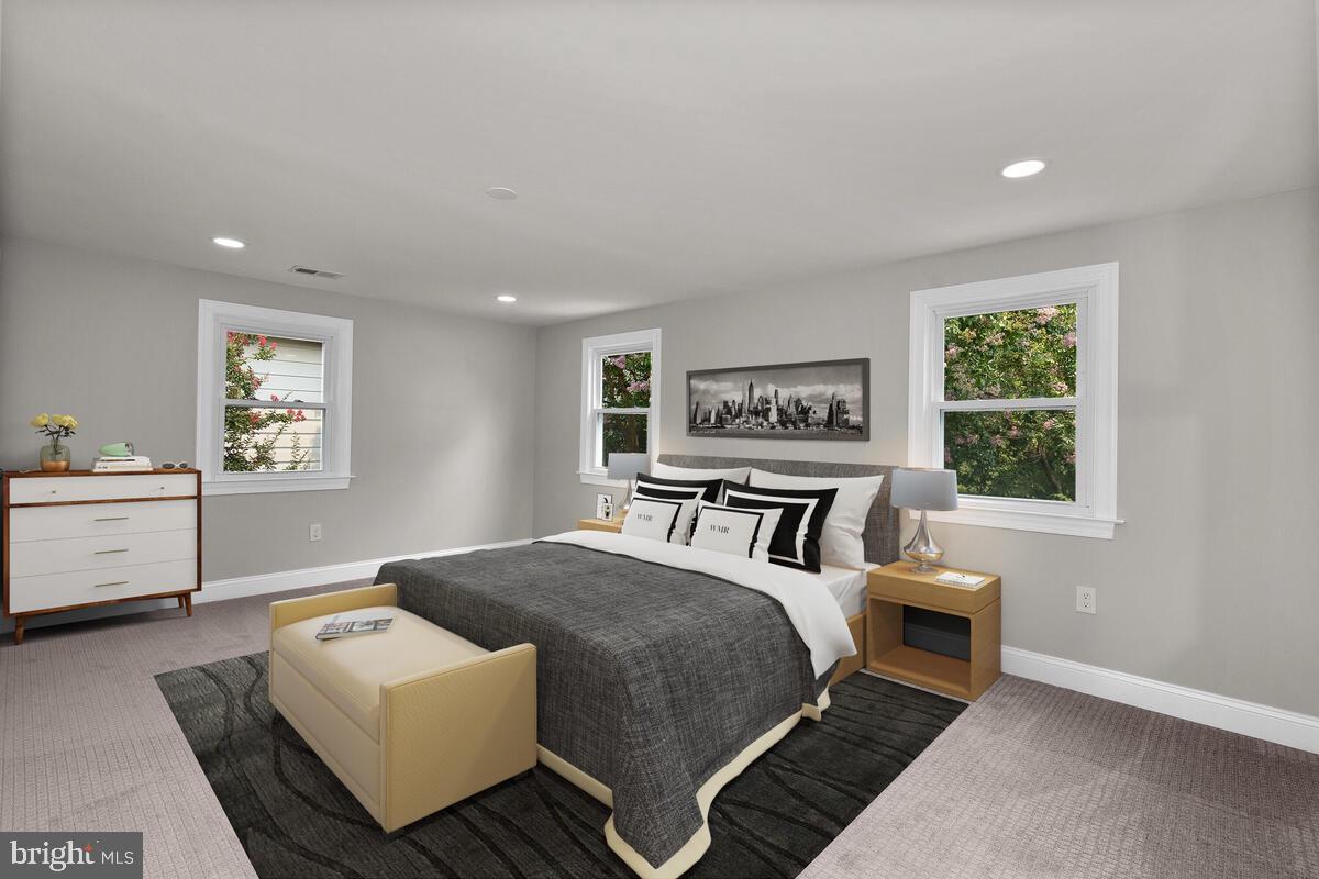 1506 Noyes Drive Silver Spring, MD 20910 - Photo 13 of 51 a bedroom with a bed and a couch