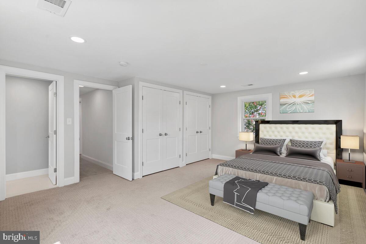 1506 Noyes Drive Silver Spring, MD 20910 - Photo 14 of 51 a bedroom with a bed and a couch