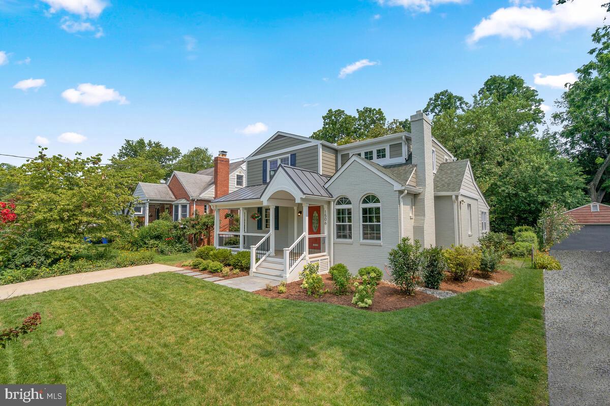 1506 Noyes Drive Silver Spring, MD 20910 - Photo 20 of 51 a front view of a house with a garden