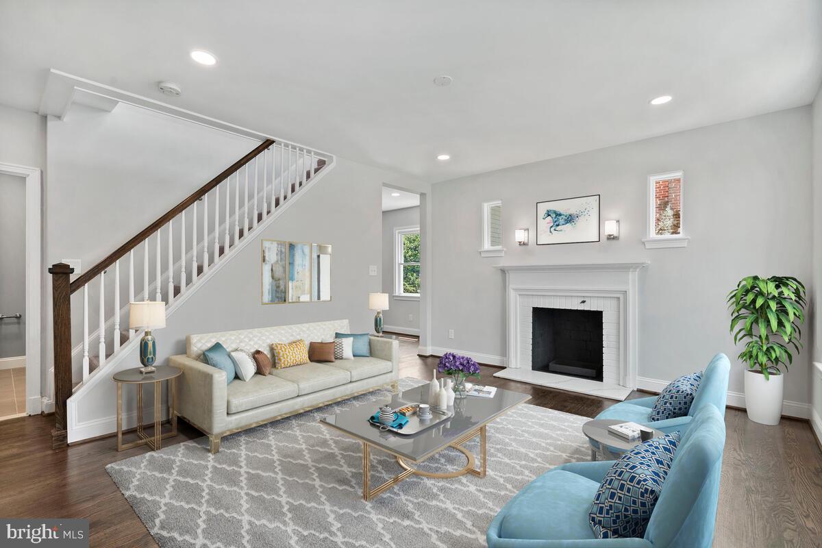 1506 Noyes Drive Silver Spring, MD 20910 - Photo 2 of 51 a living room with furniture and a fireplace