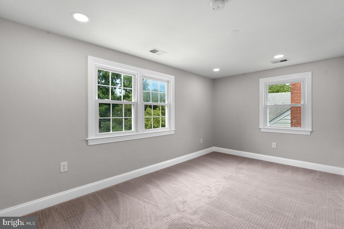 1506 Noyes Drive Silver Spring, MD 20910 - Photo 29 of 51 an empty room with windows