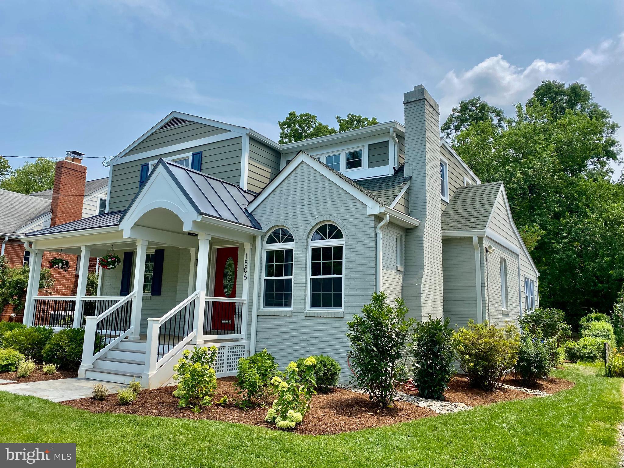 1506 Noyes Drive Silver Spring, MD 20910 - Photo 4 of 51 a front view of a house with a yard