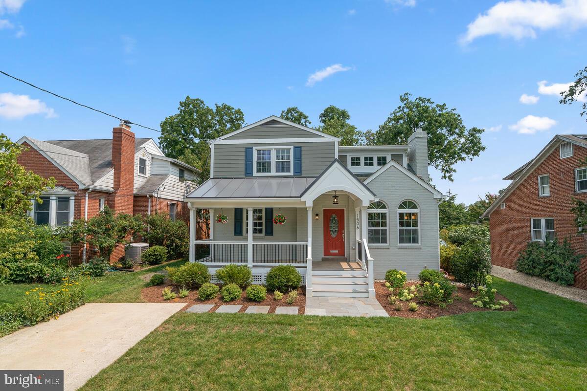1506 Noyes Drive Silver Spring, MD 20910 - Photo 41 of 51 a front view of a house with a garden