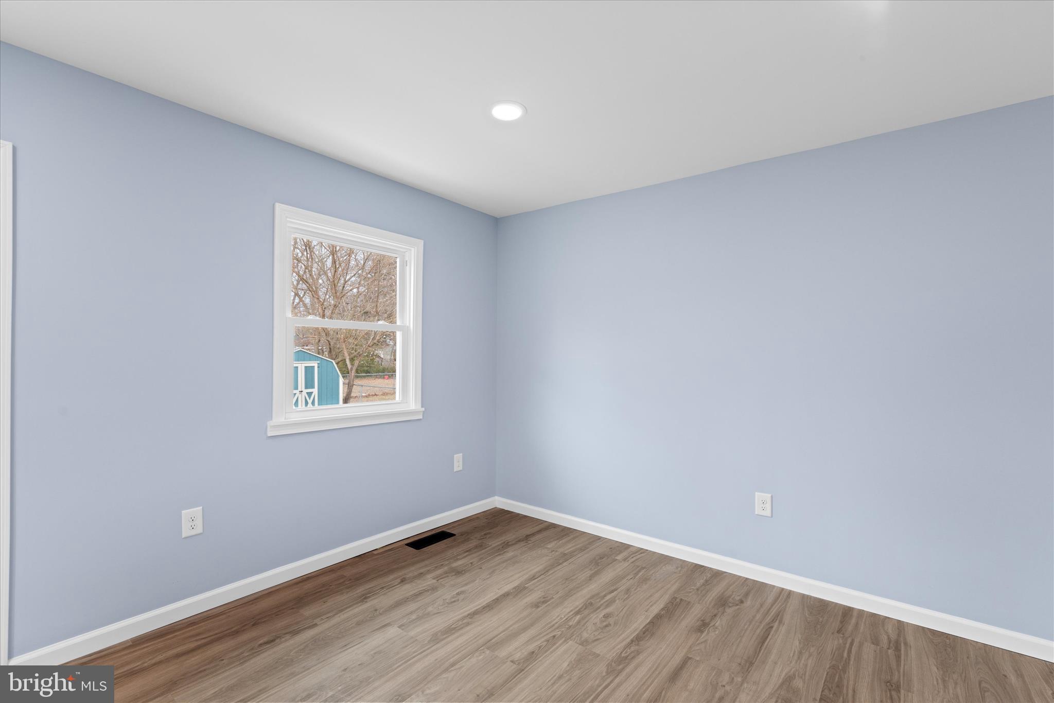 908 Spring Avenue Salisbury, MD 21804 - Photo 12 of 39 an empty room with a window