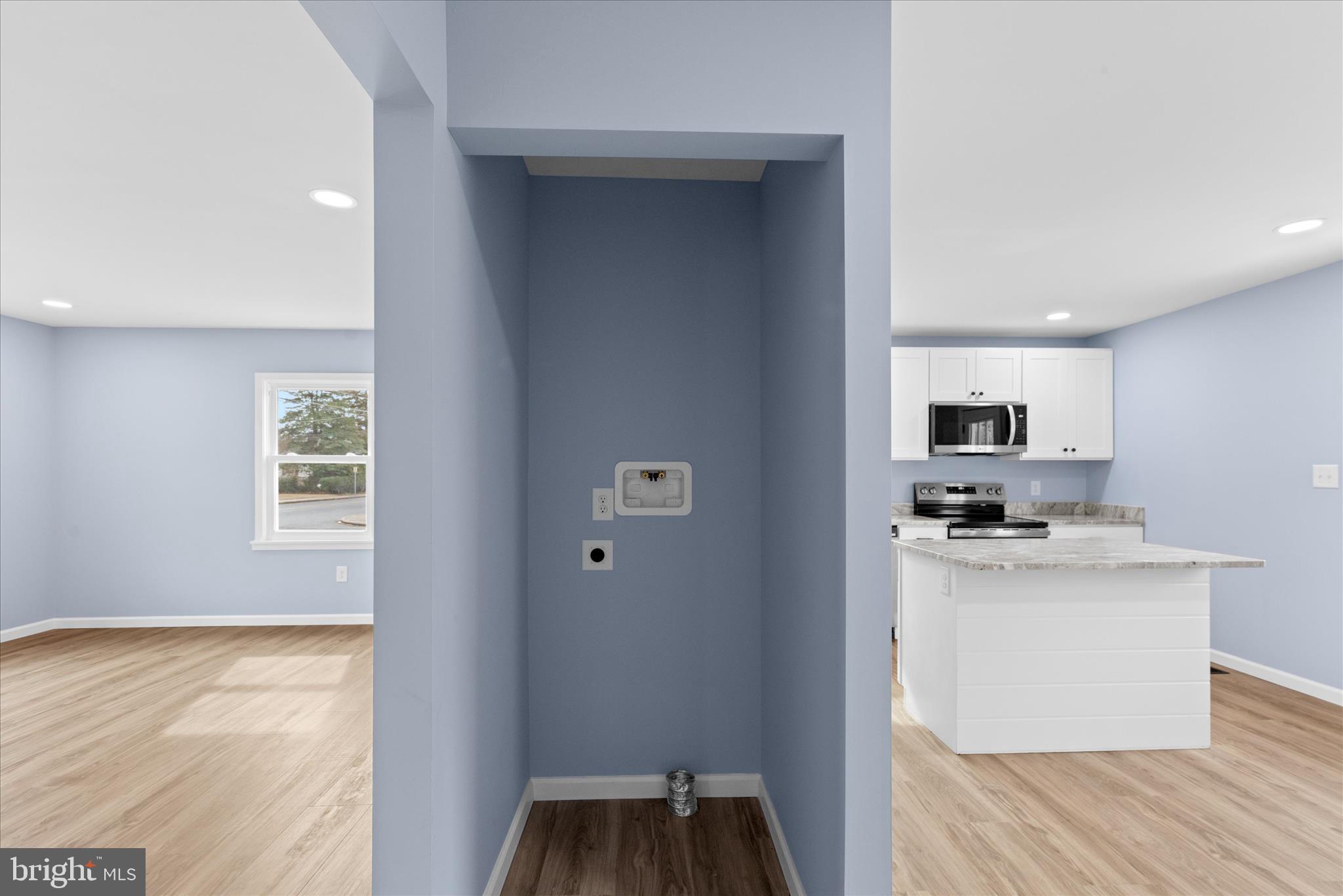 908 Spring Avenue Salisbury, MD 21804 - Photo 15 of 39 a kitchen with stainless steel appliances granite countertop a stove and a refrigerator