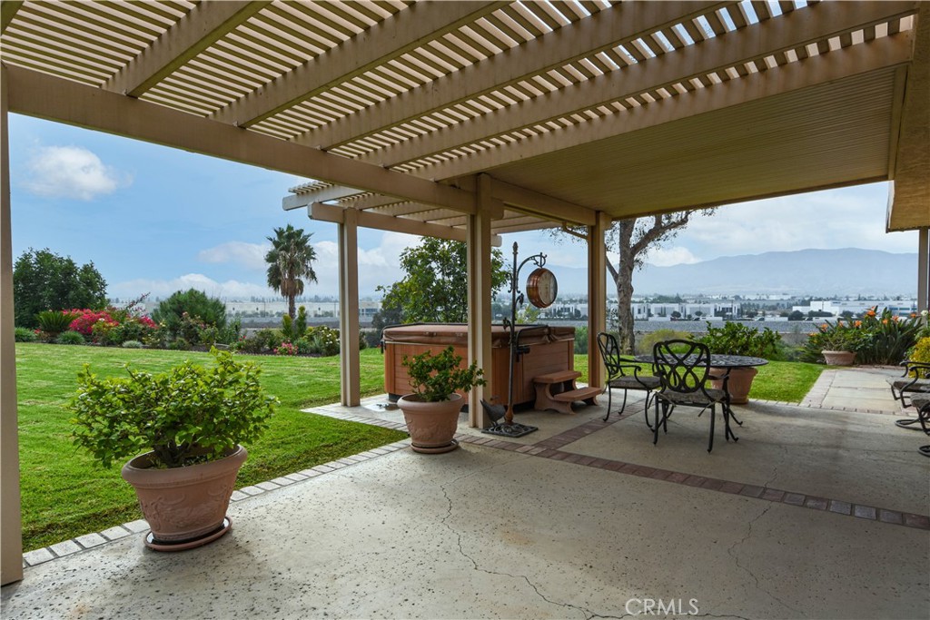 871 Kevin Corona, CA 92878 - Photo 24 of 34 a view of a patio with chairs and a table