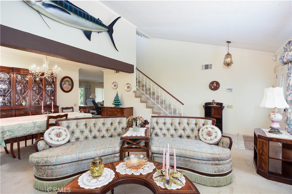 871 Kevin Corona, CA 92878 - Photo 5 of 34 a living room with furniture and a table