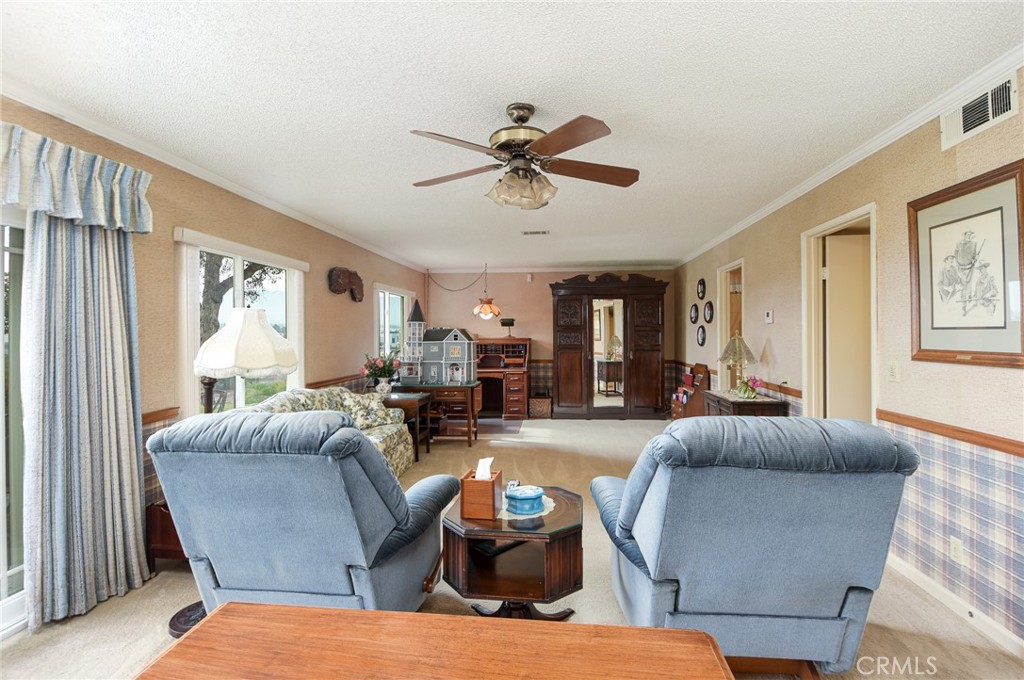 871 Kevin Corona, CA 92878 - Photo 7 of 34 a living room with furniture and a large window