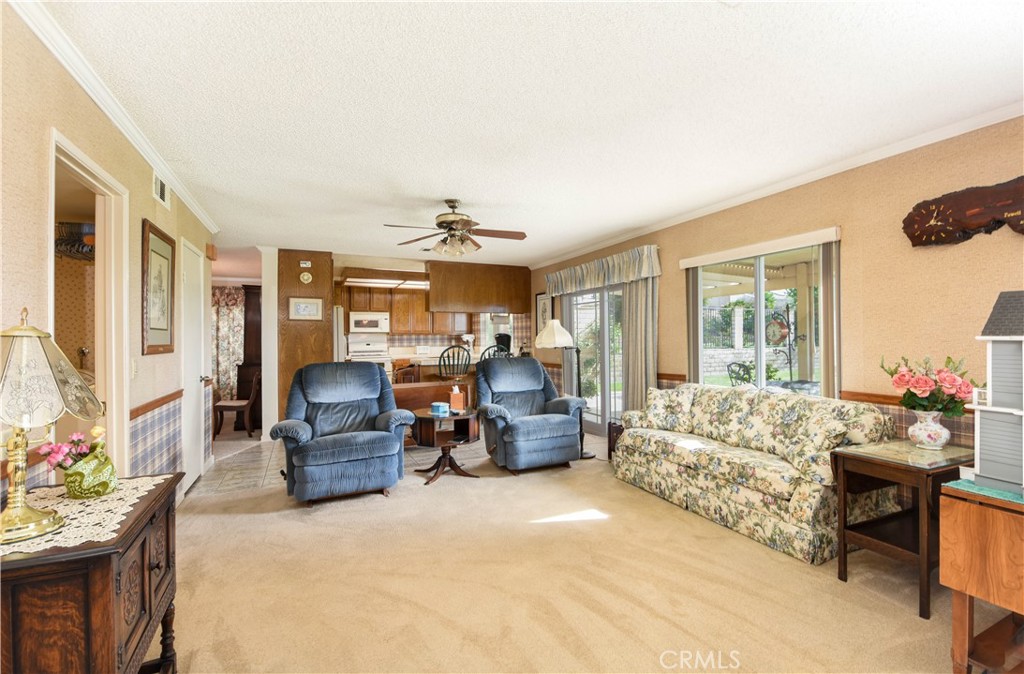 871 Kevin Corona, CA 92878 - Photo 8 of 34 a living room with furniture and a large window