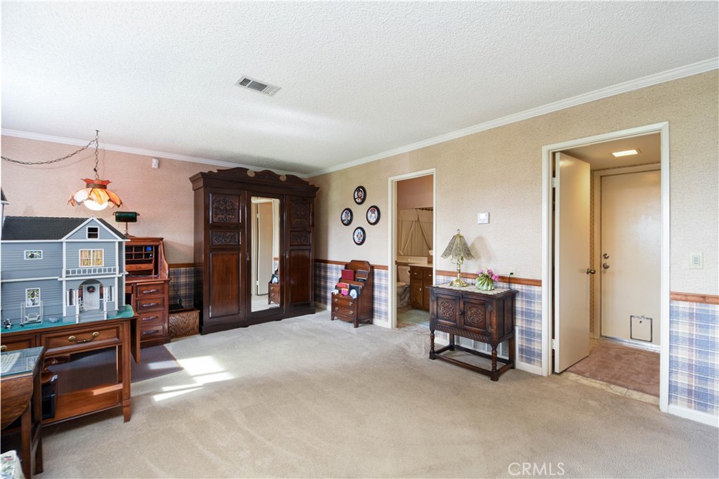 871 Kevin Corona, CA 92878 - Photo 9 of 34 a view of a livingroom with furniture and a flat screen tv