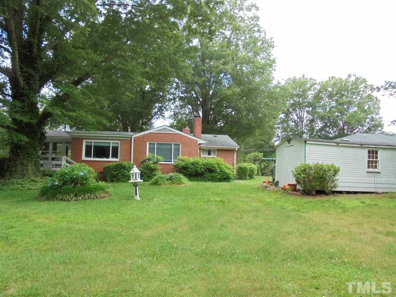 3520 Baugh Street Raleigh, NC 27604 - Photo 2 of 17 a front view of house with yard and green space