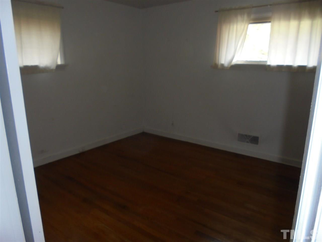 3520 Baugh Street Raleigh, NC 27604 - Photo 12 of 17 an empty room with a window