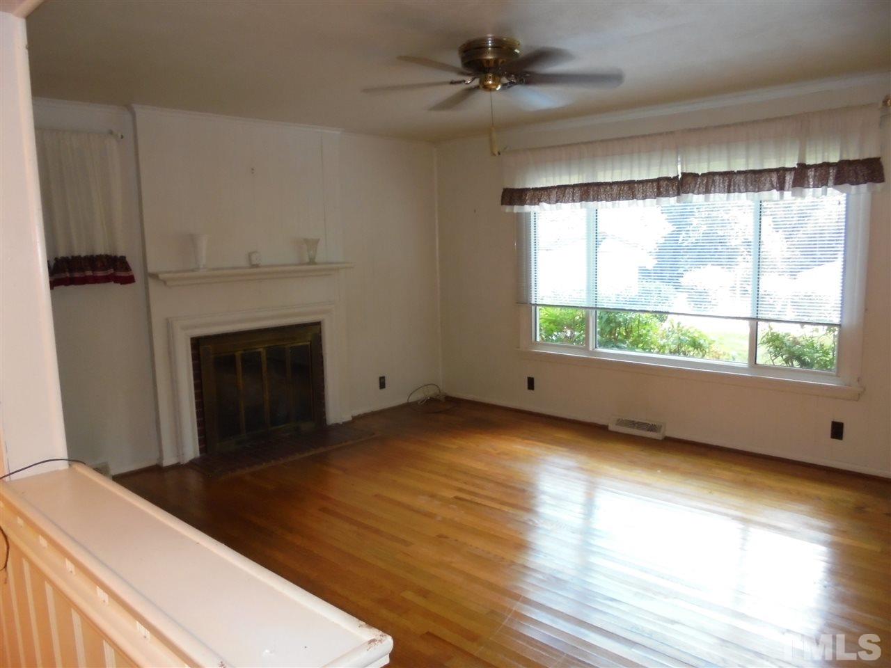 3520 Baugh Street Raleigh, NC 27604 - Photo 13 of 17 a living room with a large window