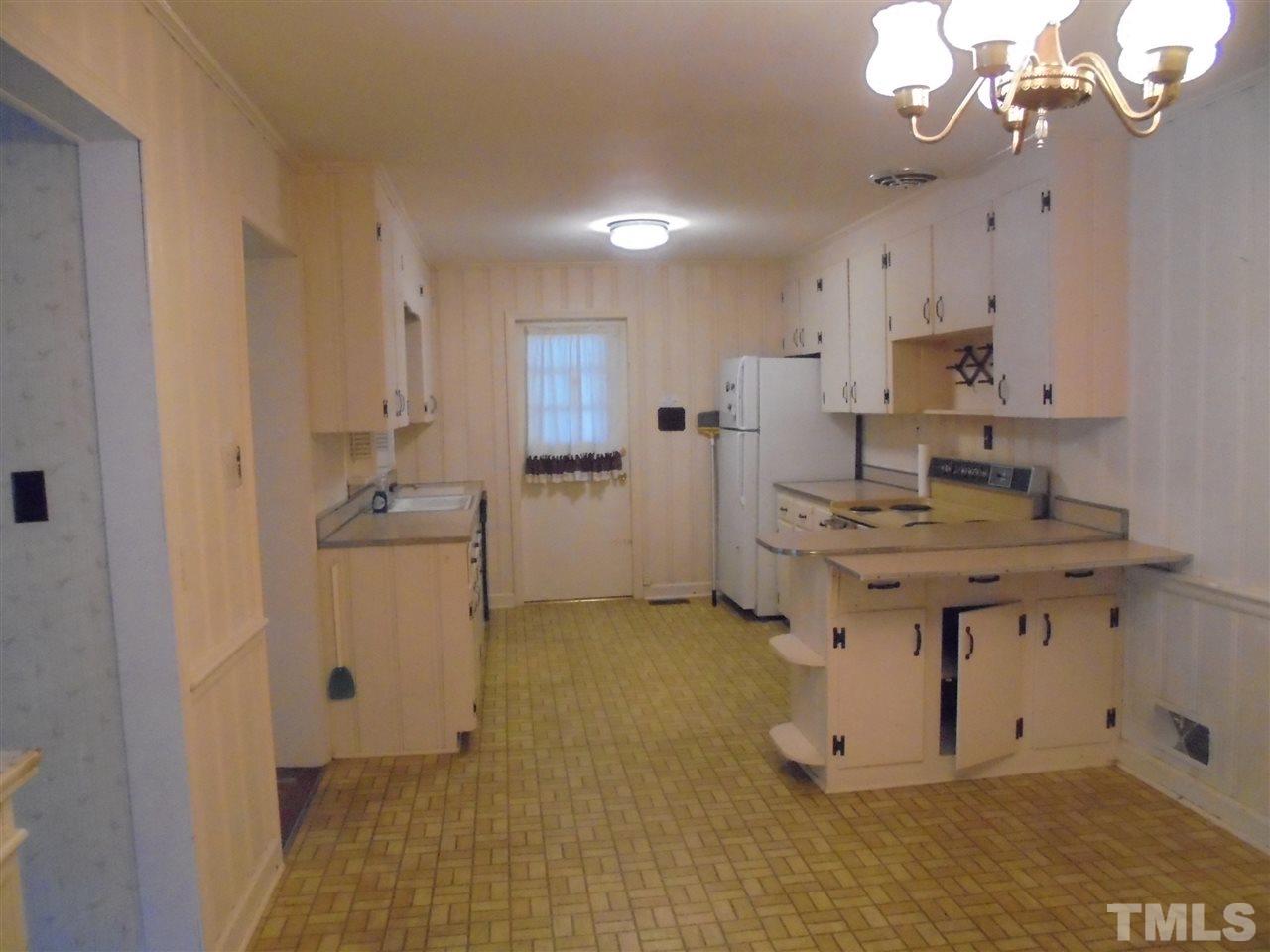 3520 Baugh Street Raleigh, NC 27604 - Photo 15 of 17 a room with view of kitchen with sink appliances and cabinets