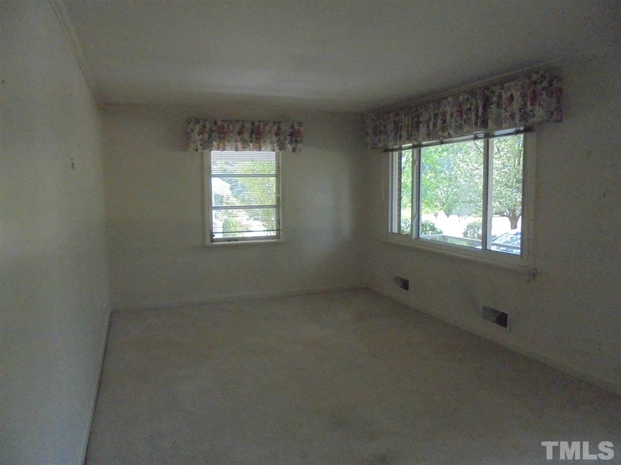 3520 Baugh Street Raleigh, NC 27604 - Photo 6 of 17 an empty room with a window