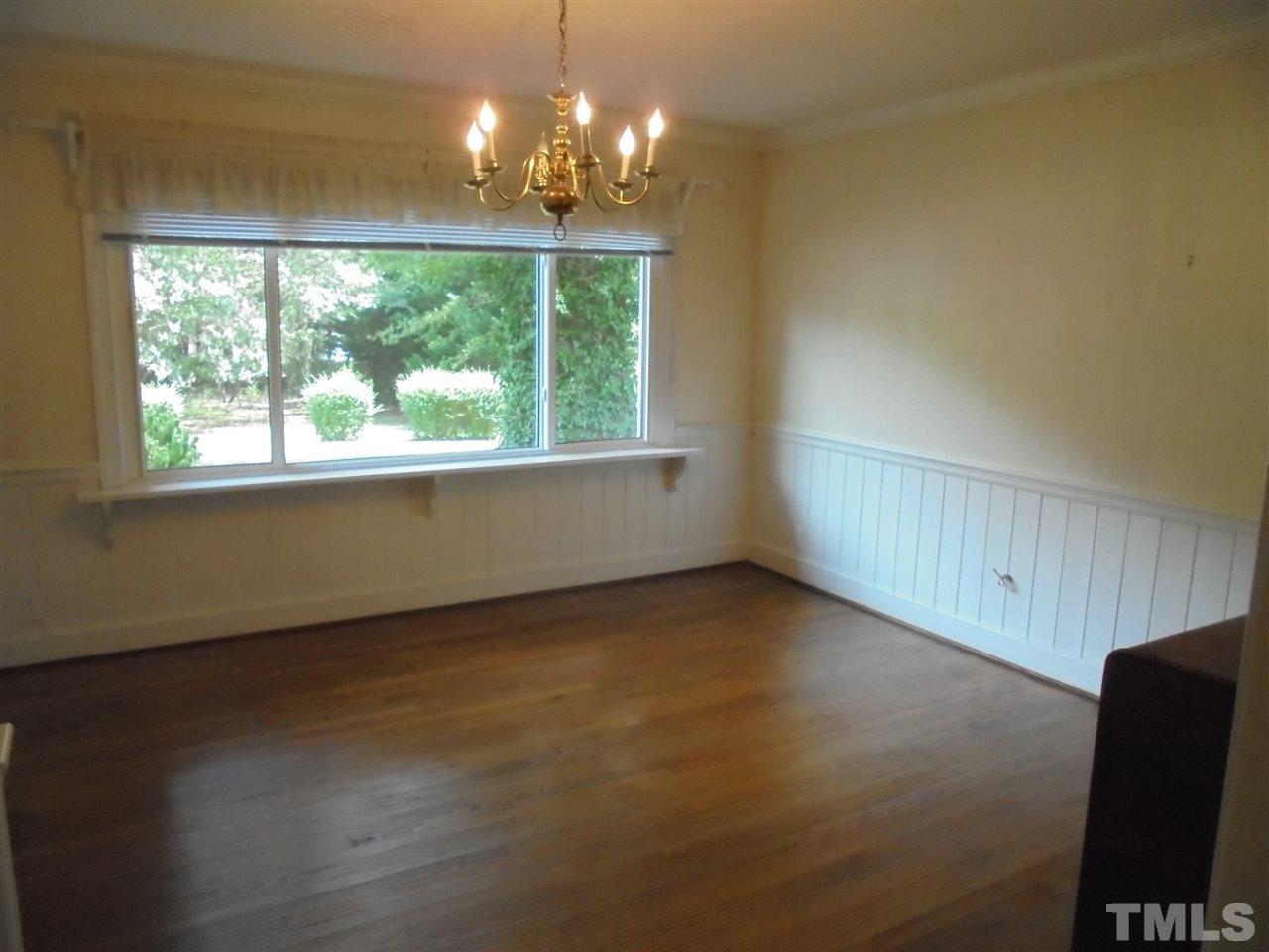 3520 Baugh Street Raleigh, NC 27604 - Photo 9 of 17 a view of an empty room with a window