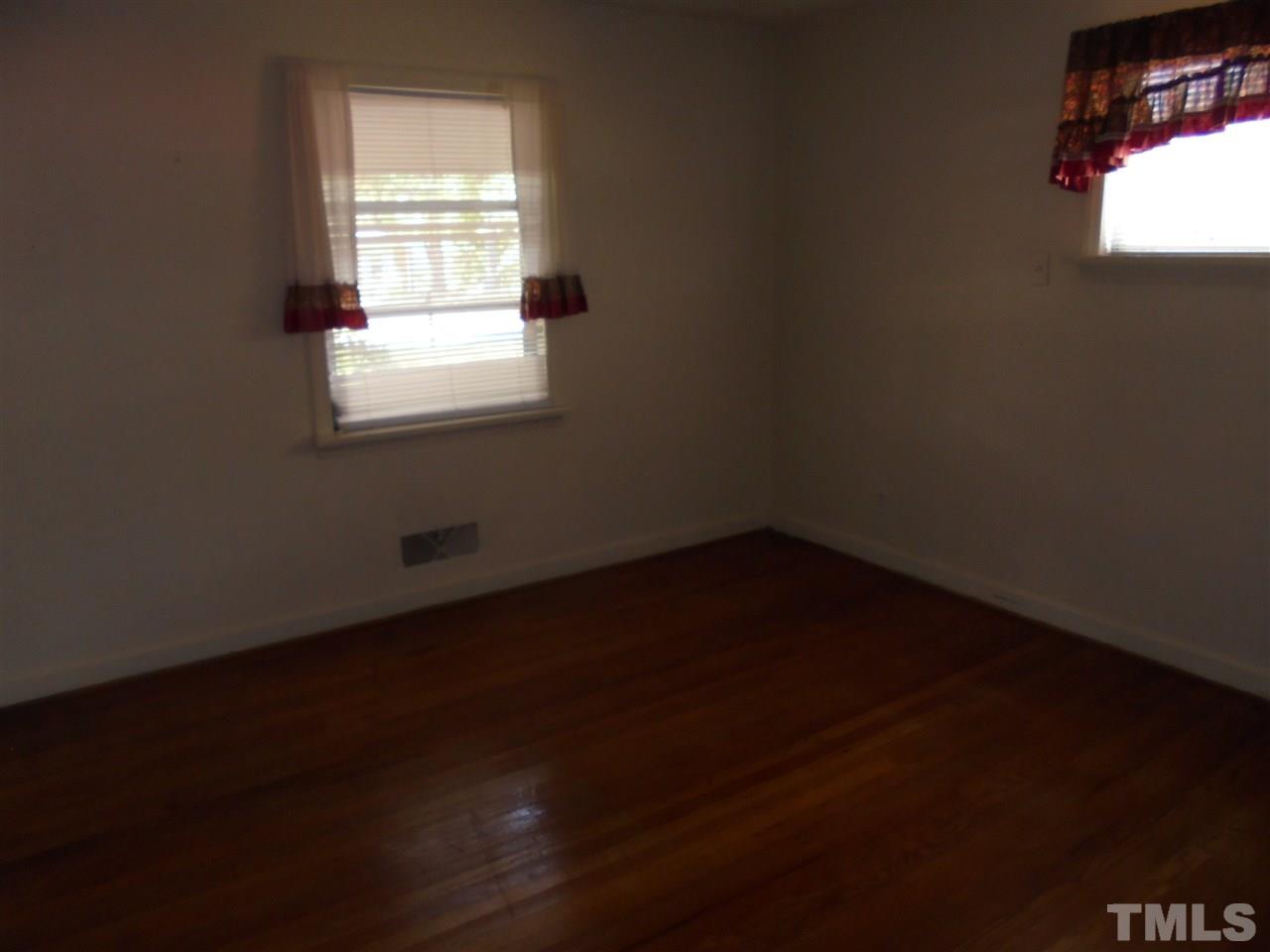 3520 Baugh Street Raleigh, NC 27604 - Photo 10 of 17 an empty room with a window