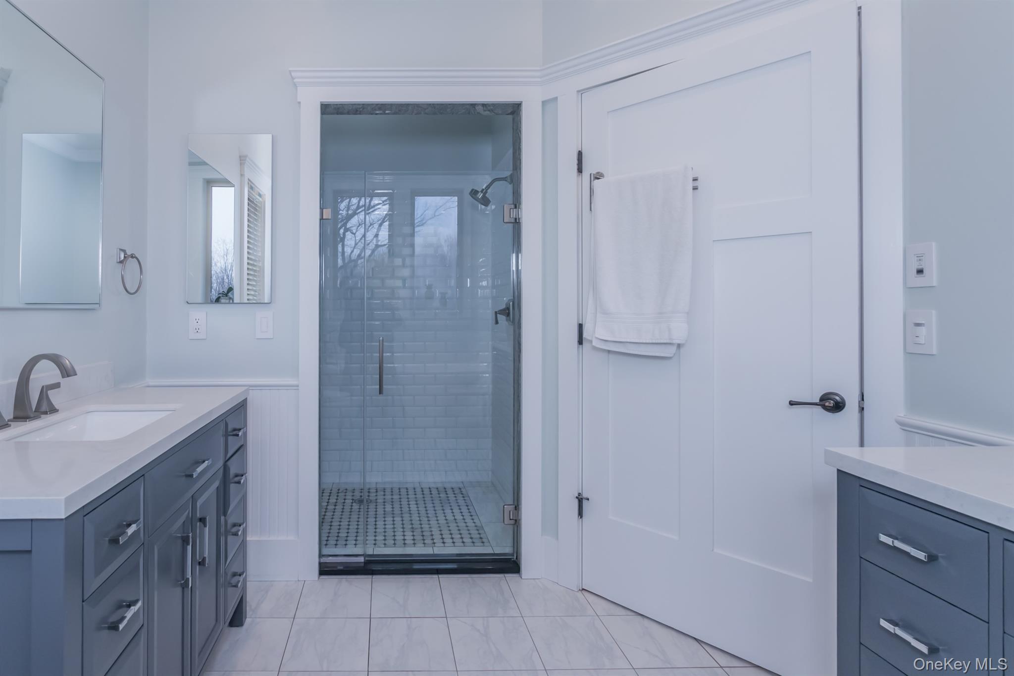 1 Peck Ridge Road Warwick, NY 10990 - Photo 19 of 50 a bathroom with a shower sink and mirror