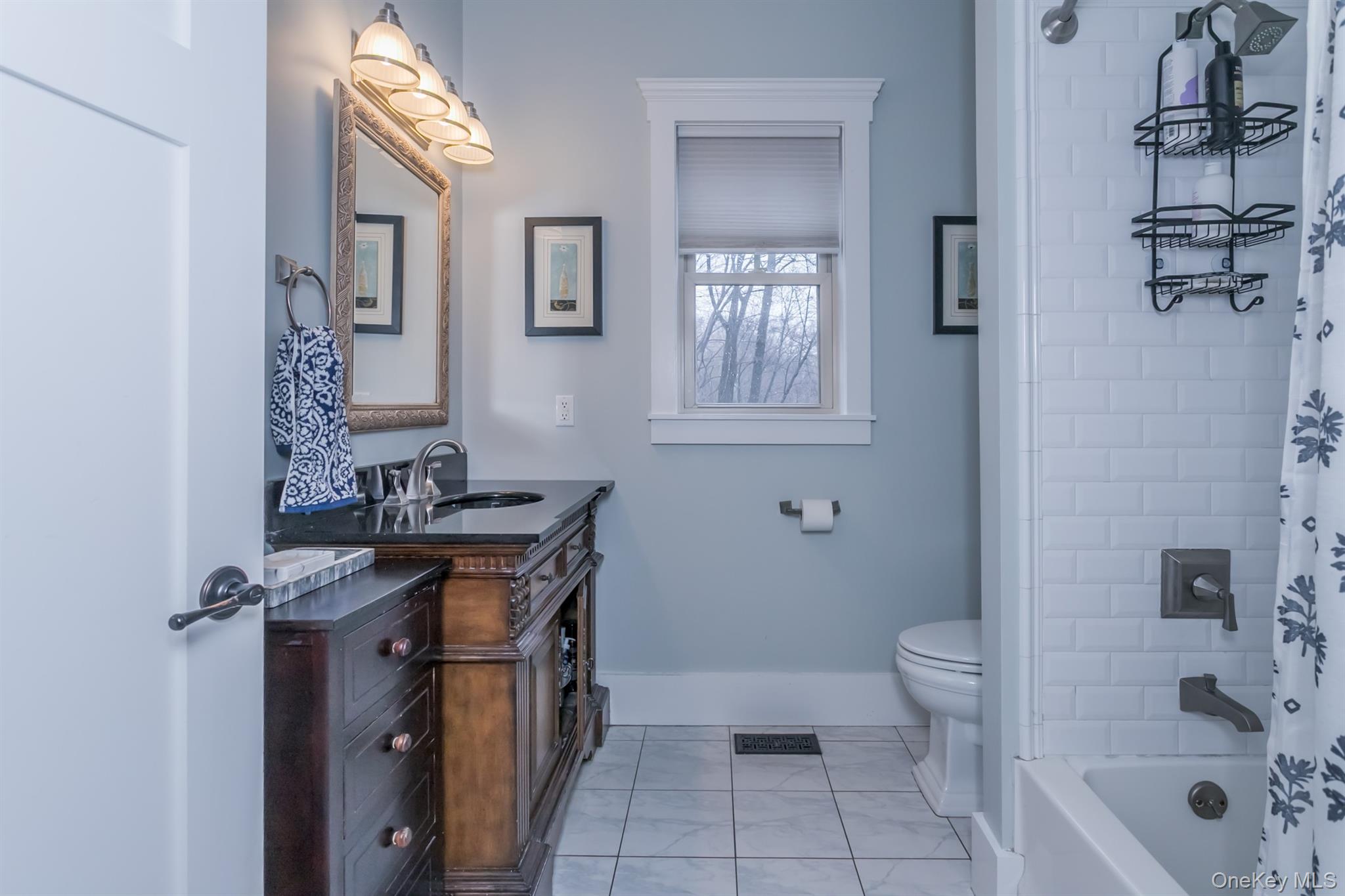 1 Peck Ridge Road Warwick, NY 10990 - Photo 22 of 50 a bathroom with a sink a toilet and shower
