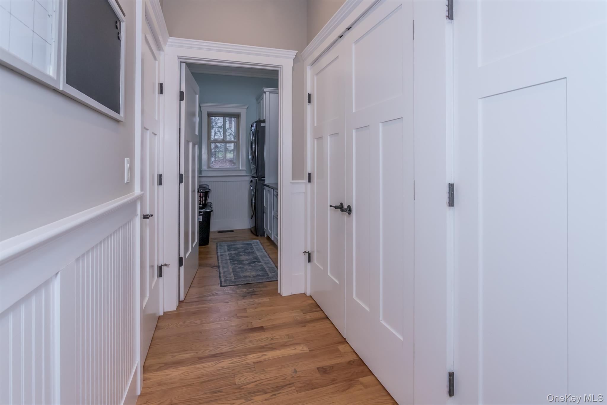 1 Peck Ridge Road Warwick, NY 10990 - Photo 23 of 50 a view of a hallway with wooden floor and closet area