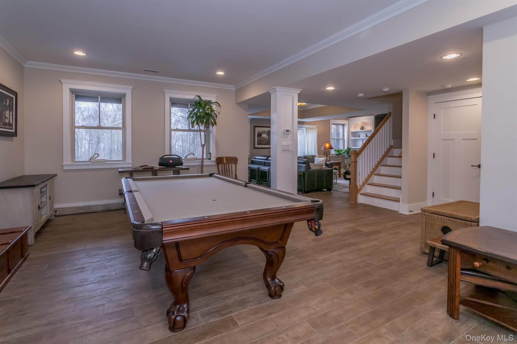 1 Peck Ridge Road Warwick, NY 10990 - Photo 35 of 50 a room with furniture pool table wooden floor and windows