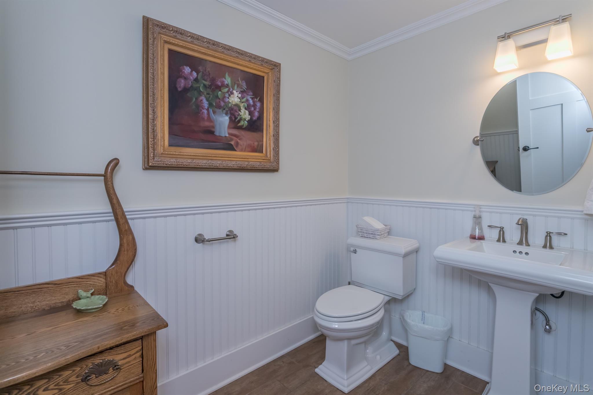 1 Peck Ridge Road Warwick, NY 10990 - Photo 39 of 50 a bathroom with a toilet sink and mirror