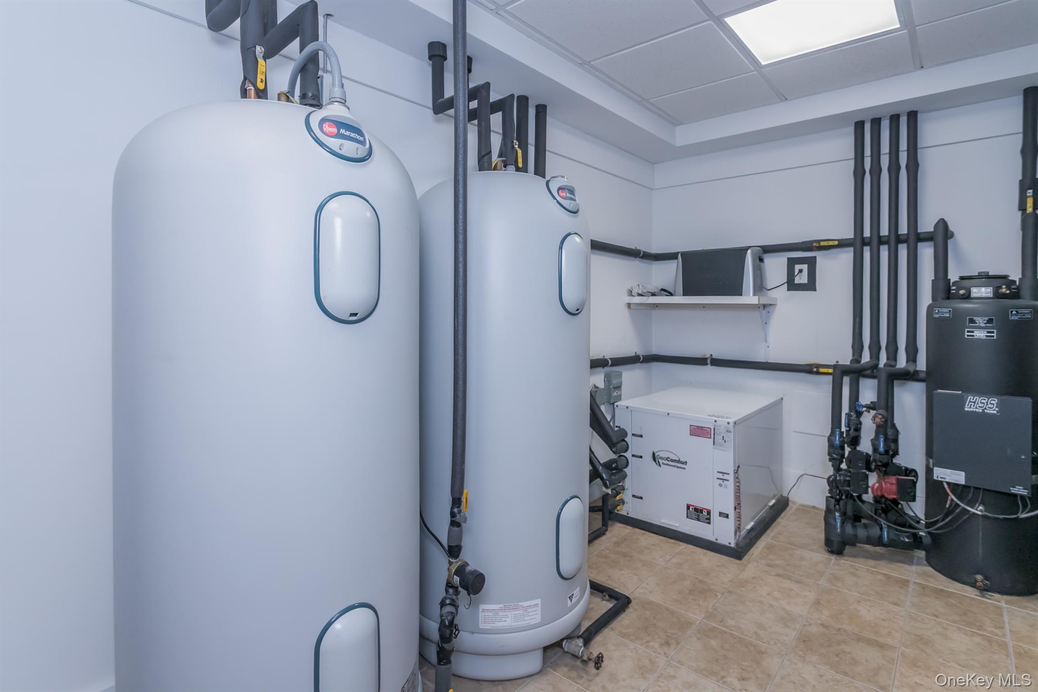 1 Peck Ridge Road Warwick, NY 10990 - Photo 40 of 50 a view of storage and utility room with racks on the wall