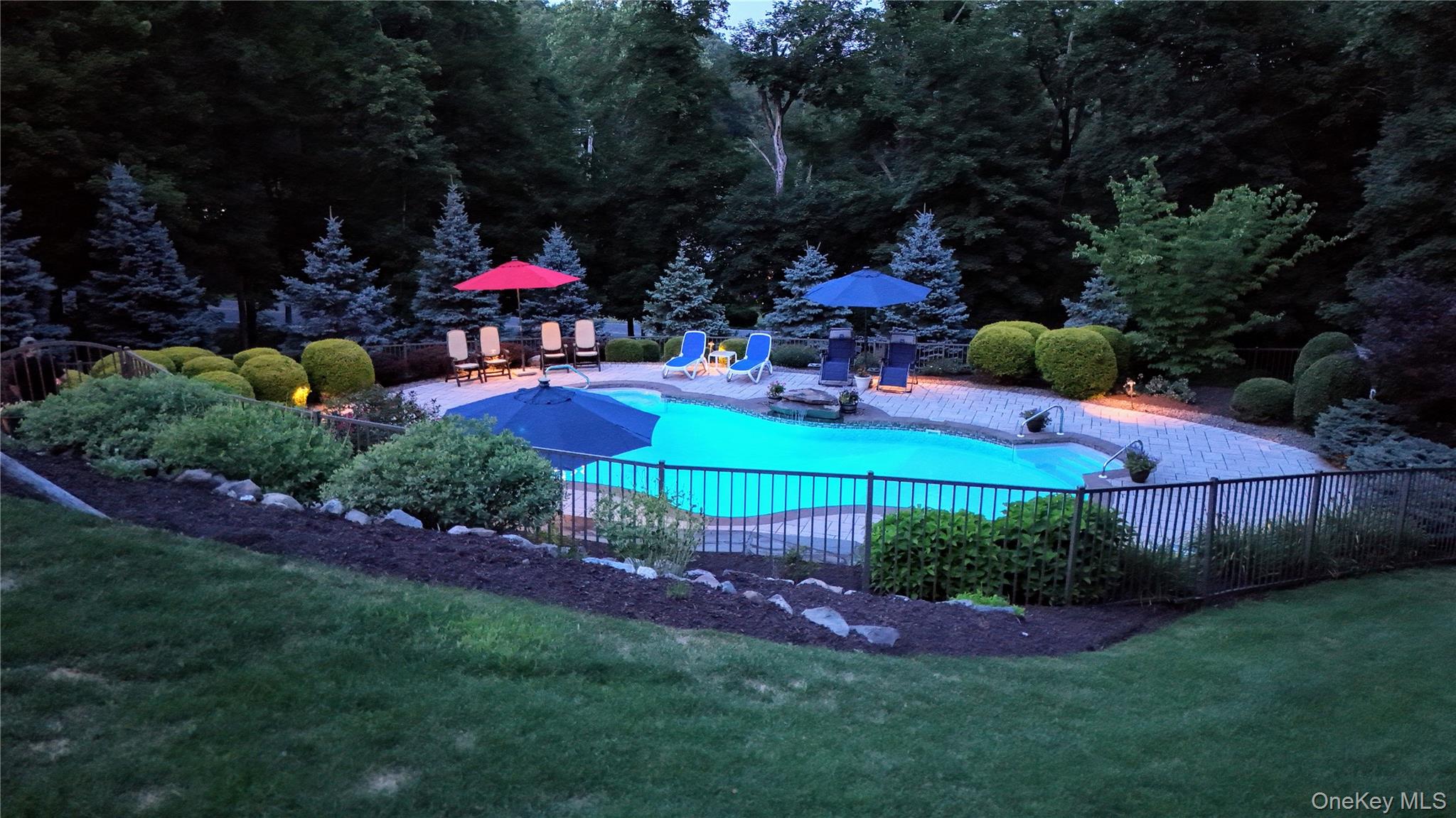 1 Peck Ridge Road Warwick, NY 10990 - Photo 47 of 50 a view of a chairs and table in backyard
