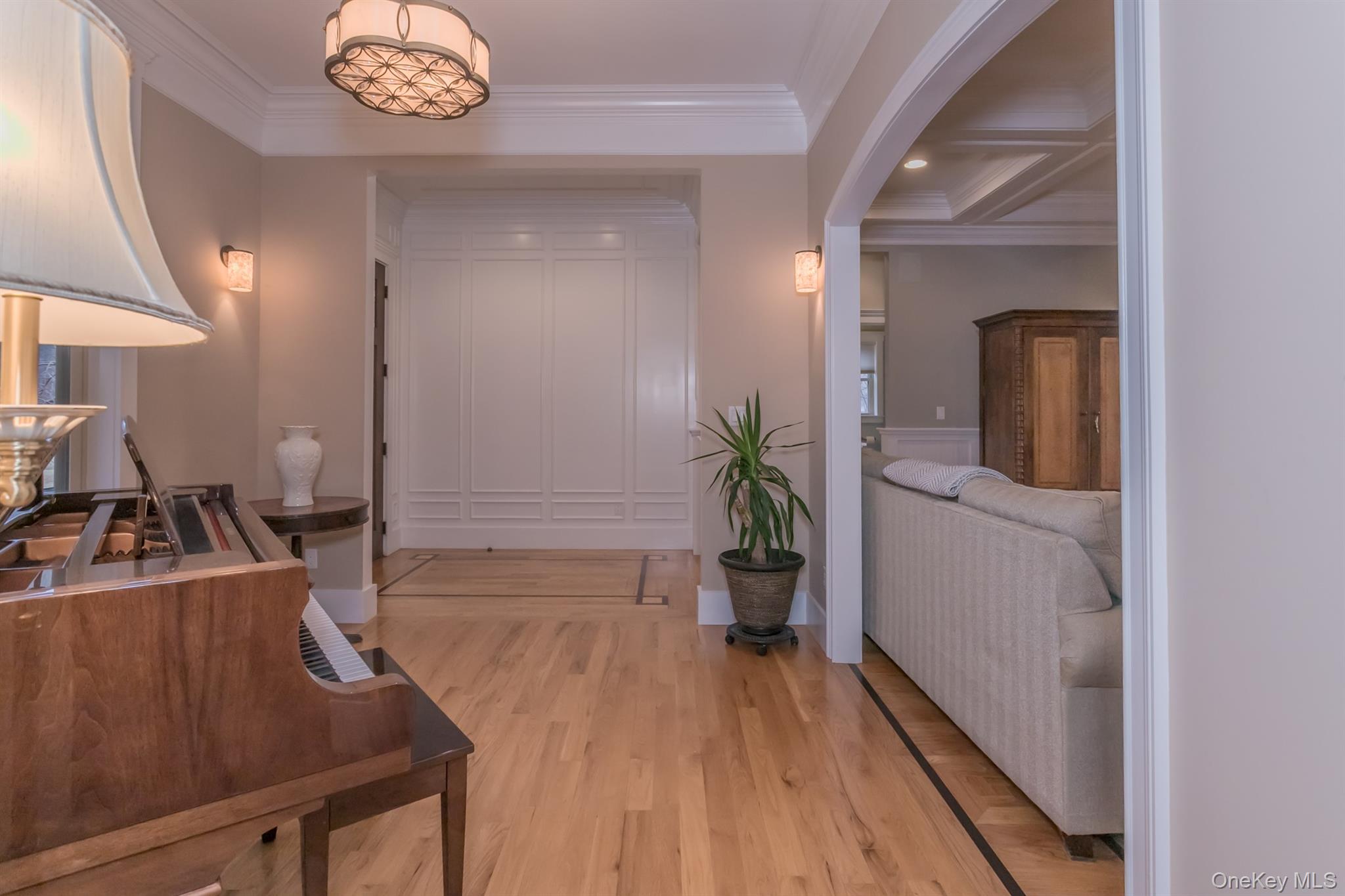 1 Peck Ridge Road Warwick, NY 10990 - Photo 8 of 50 a view of a hallway with wooden floor and staircase