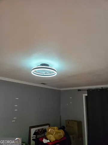 a view of a room with rack and wooden floor