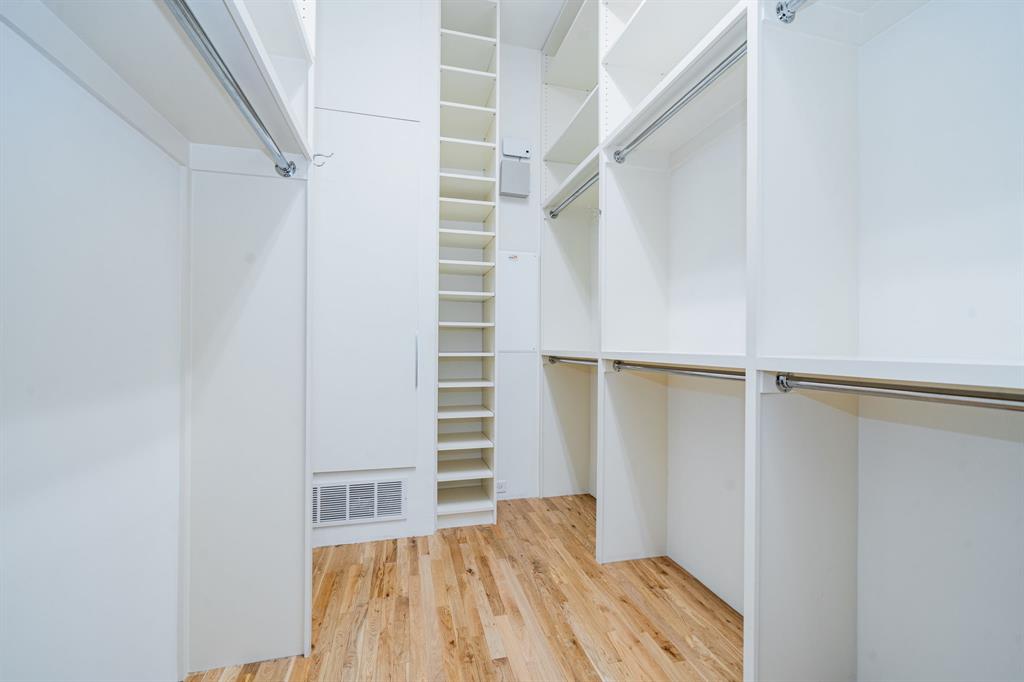 2325 Rusk Place Dallas, TX 75204 - Photo 20 of 27 a view of walk in closet with empty racks