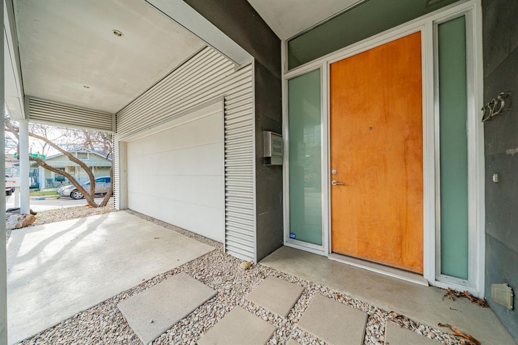 2325 Rusk Place Dallas, TX 75204 - Photo 3 of 27 a view of a big room with closet and wooden floor