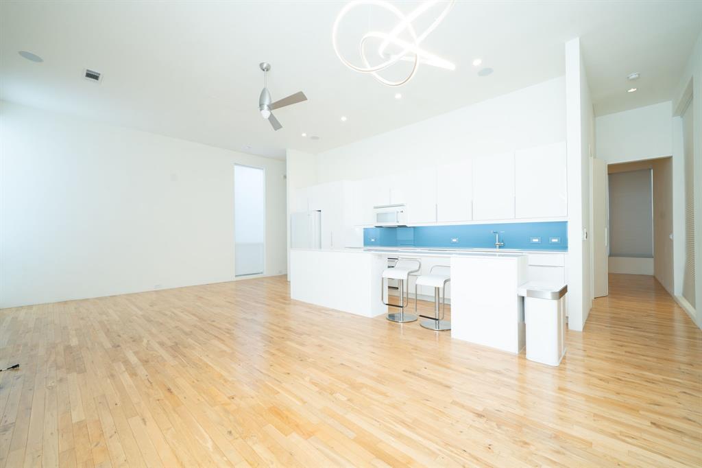 2325 Rusk Place Dallas, TX 75204 - Photo 9 of 27 a view of empty room with wooden floor