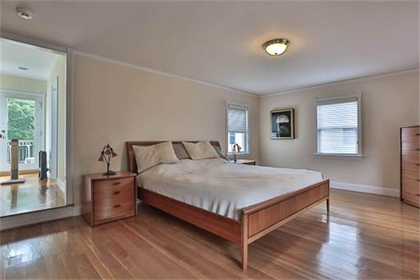 2648 Massachusetts Avenue Lexington, MA 02421 - Photo 13 of 19 a bedroom with a bed and window