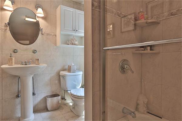 2648 Massachusetts Avenue Lexington, MA 02421 - Photo 16 of 19 a bathroom with a toilet sink and mirror