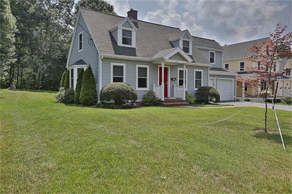 2648 Massachusetts Avenue Lexington, MA 02421 - Photo 19 of 19 a front view of a house with a yard