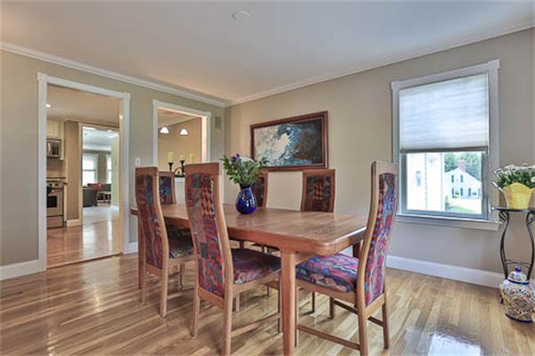 2648 Massachusetts Avenue Lexington, MA 02421 - Photo 3 of 19 a view of a dining room with furniture and wooden floor