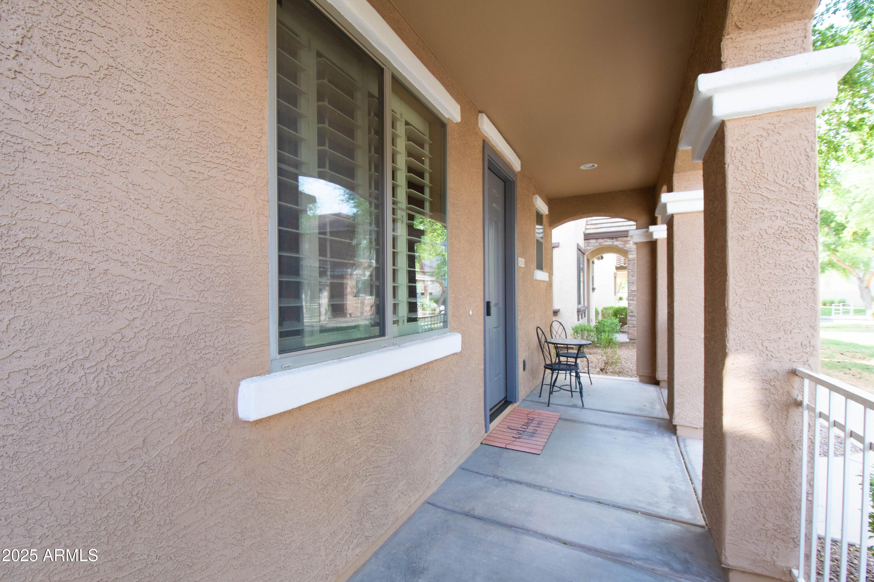 3924 South Napa Lane Gilbert, AZ 85297 - Photo 2 of 42 a view of an entryway with wooden floor and a yard