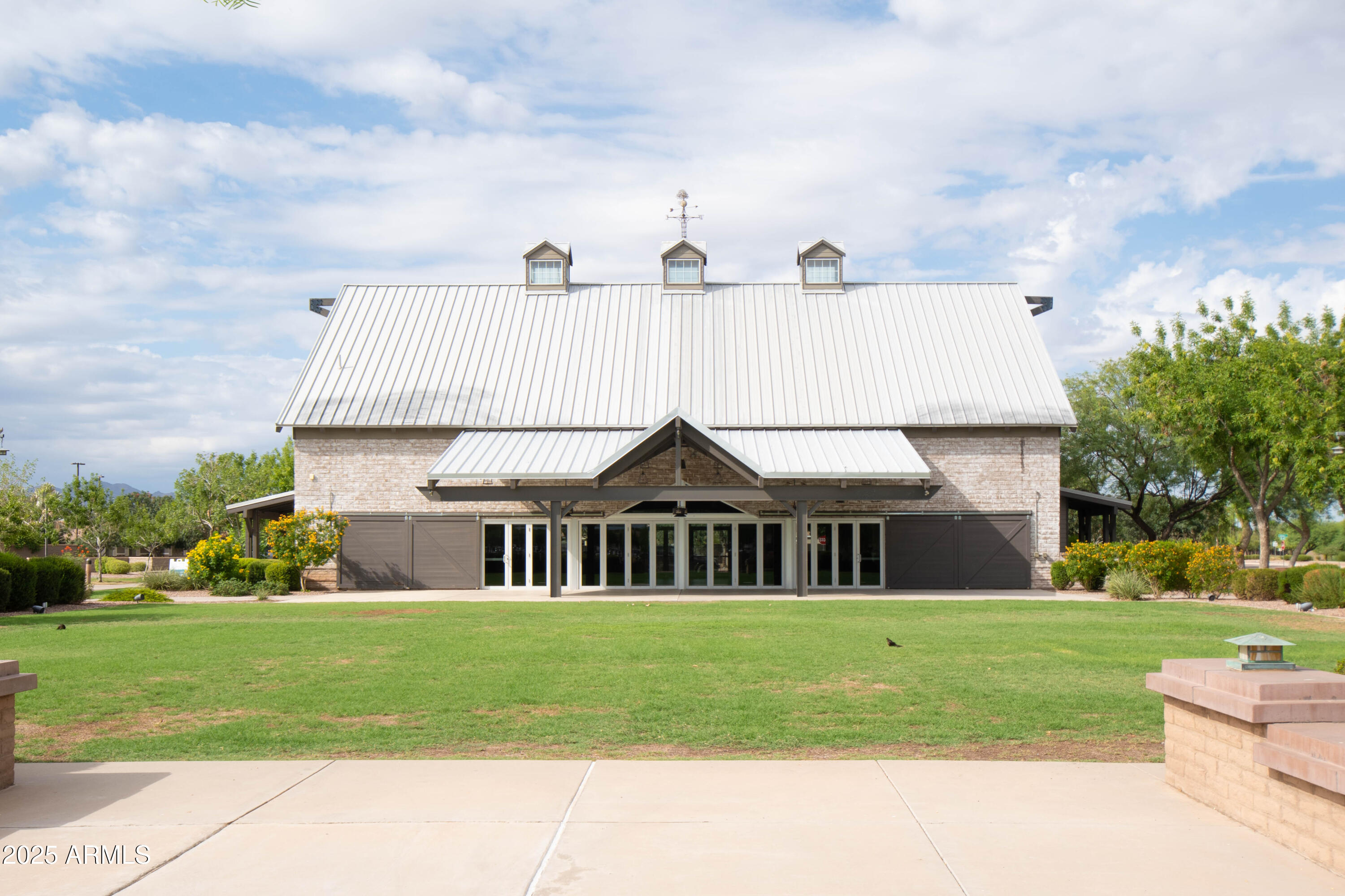 3924 South Napa Lane Gilbert, AZ 85297 - Photo 39 of 42 a front view of a house with a yard