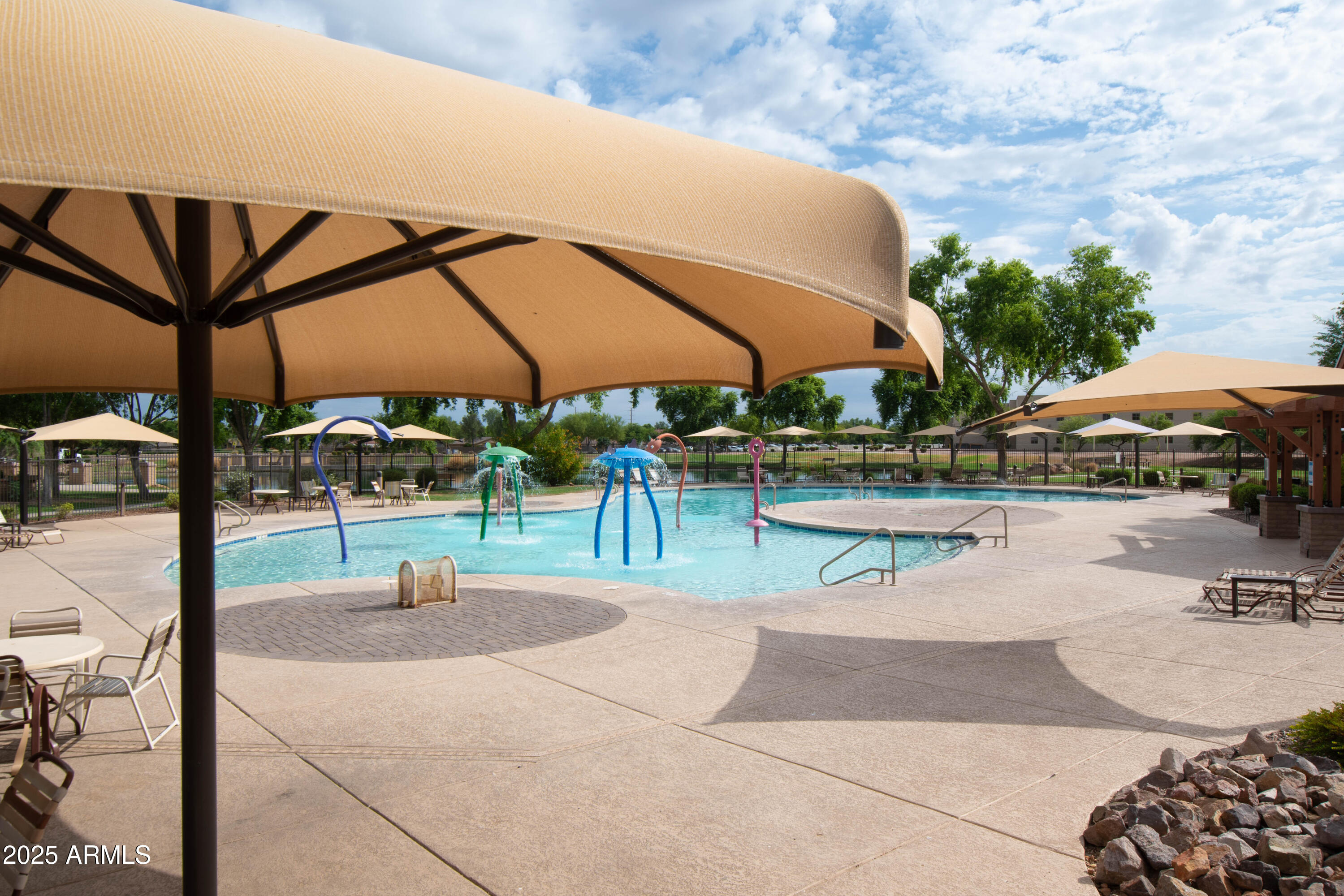 3924 South Napa Lane Gilbert, AZ 85297 - Photo 40 of 42 a view of a swimming pool with a patio