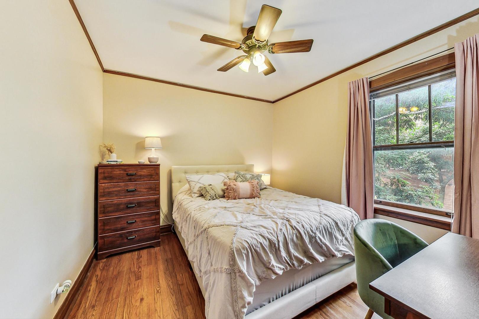 2004 West Walton Street, Unit 2B Chicago, IL 60622 - Photo 10 of 17 a bedroom with a bed and a desk