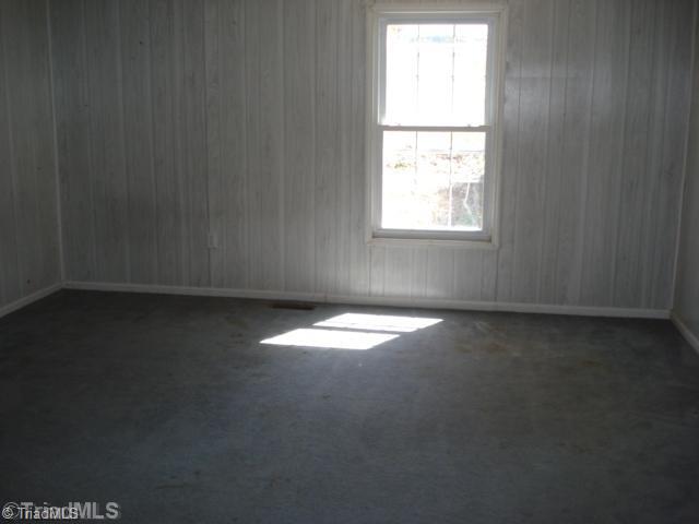 227 Old Covered Bridge Road Madison, NC 27025 - Photo 5 of 12 1st Bedroom.