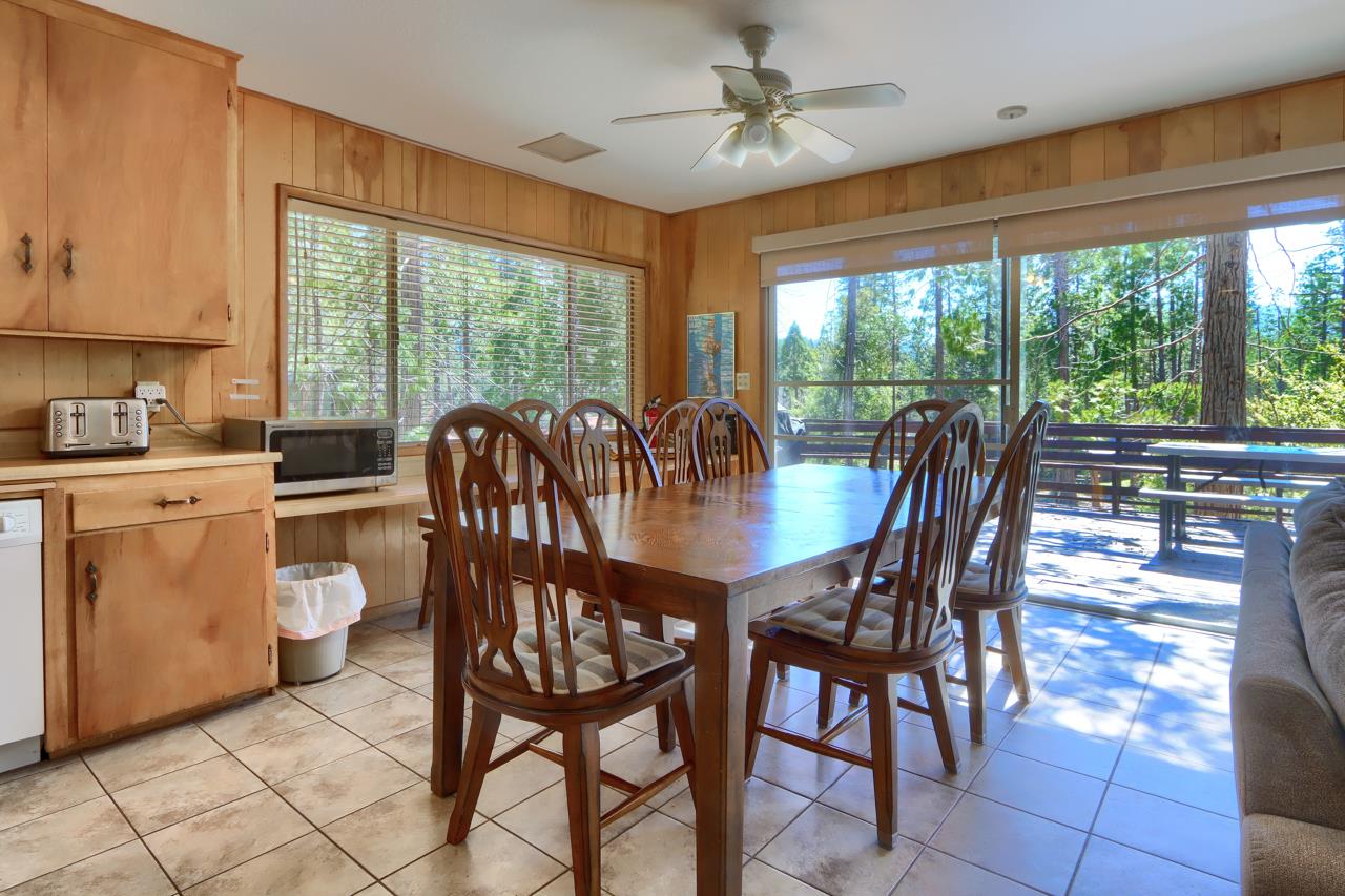 2628 West Bruce Road Wawona, CA 95389 - Photo 11 of 33 a view of a dining room with furniture window and outside view