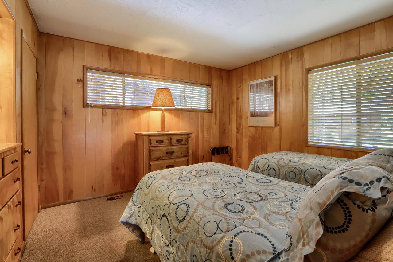 2628 West Bruce Road Wawona, CA 95389 - Photo 16 of 33 a bedroom with a bed and a window