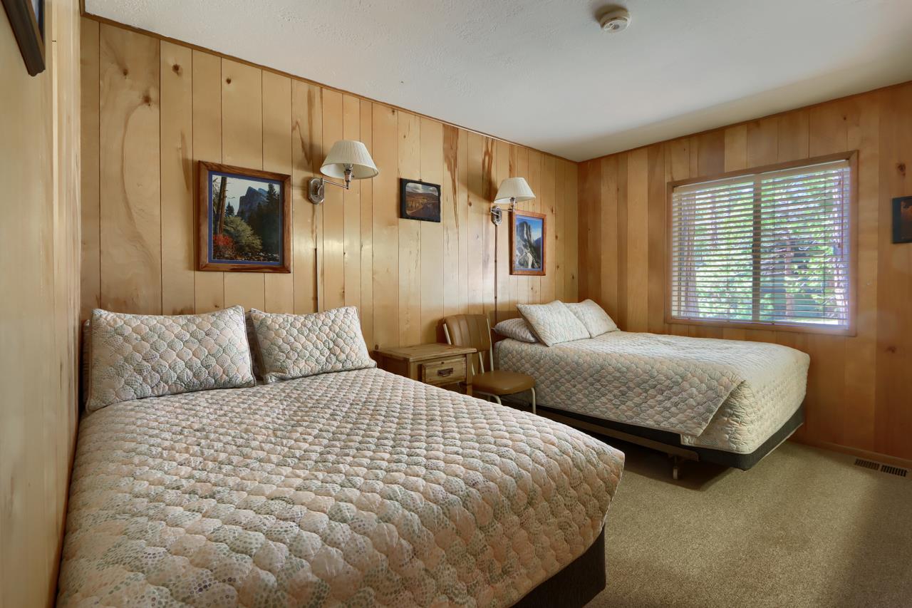 2628 West Bruce Road Wawona, CA 95389 - Photo 19 of 33 a bedroom with two beds and painting on the wall