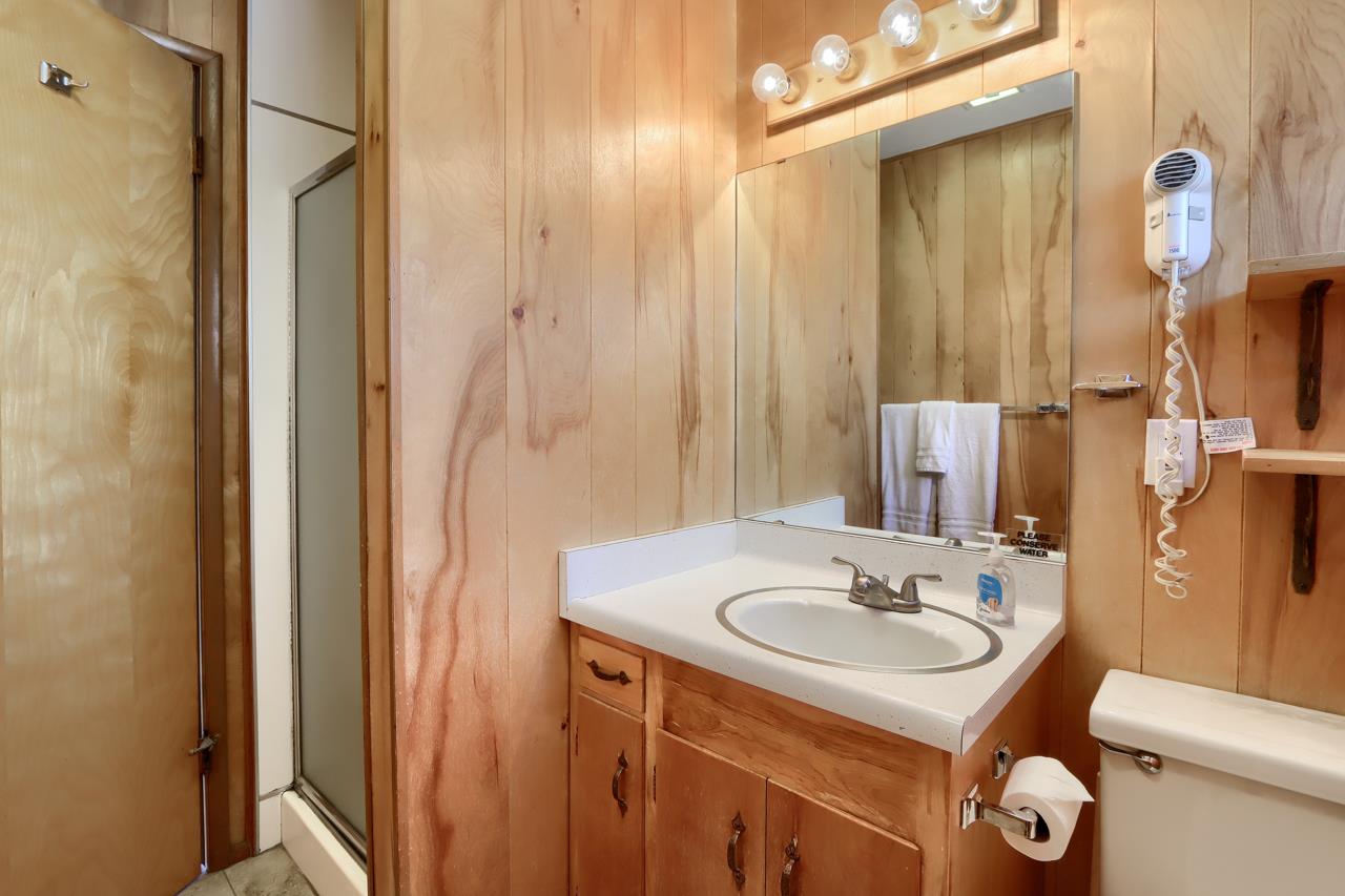 2628 West Bruce Road Wawona, CA 95389 - Photo 21 of 33 a bathroom with a sink a toilet and shower