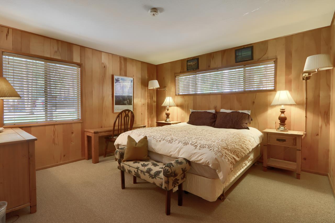 2628 West Bruce Road Wawona, CA 95389 - Photo 23 of 33 a bedroom with a bed and dresser