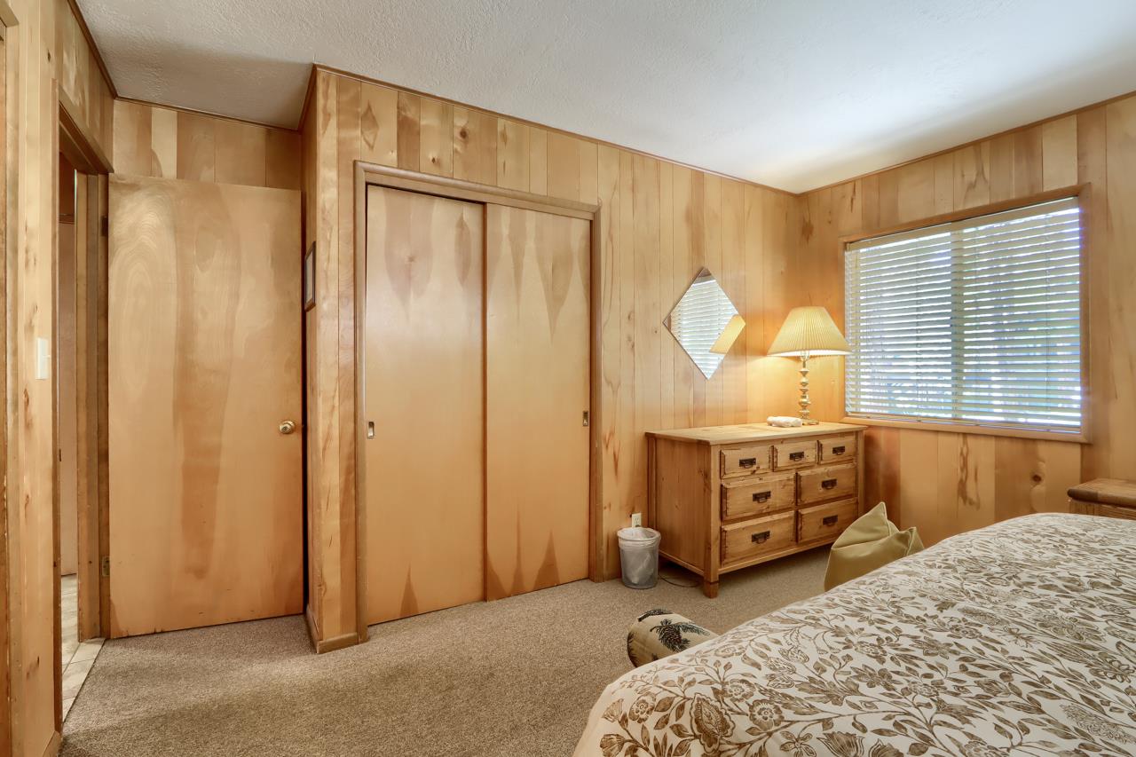 2628 West Bruce Road Wawona, CA 95389 - Photo 24 of 33 a bed room with a bed and a dresser