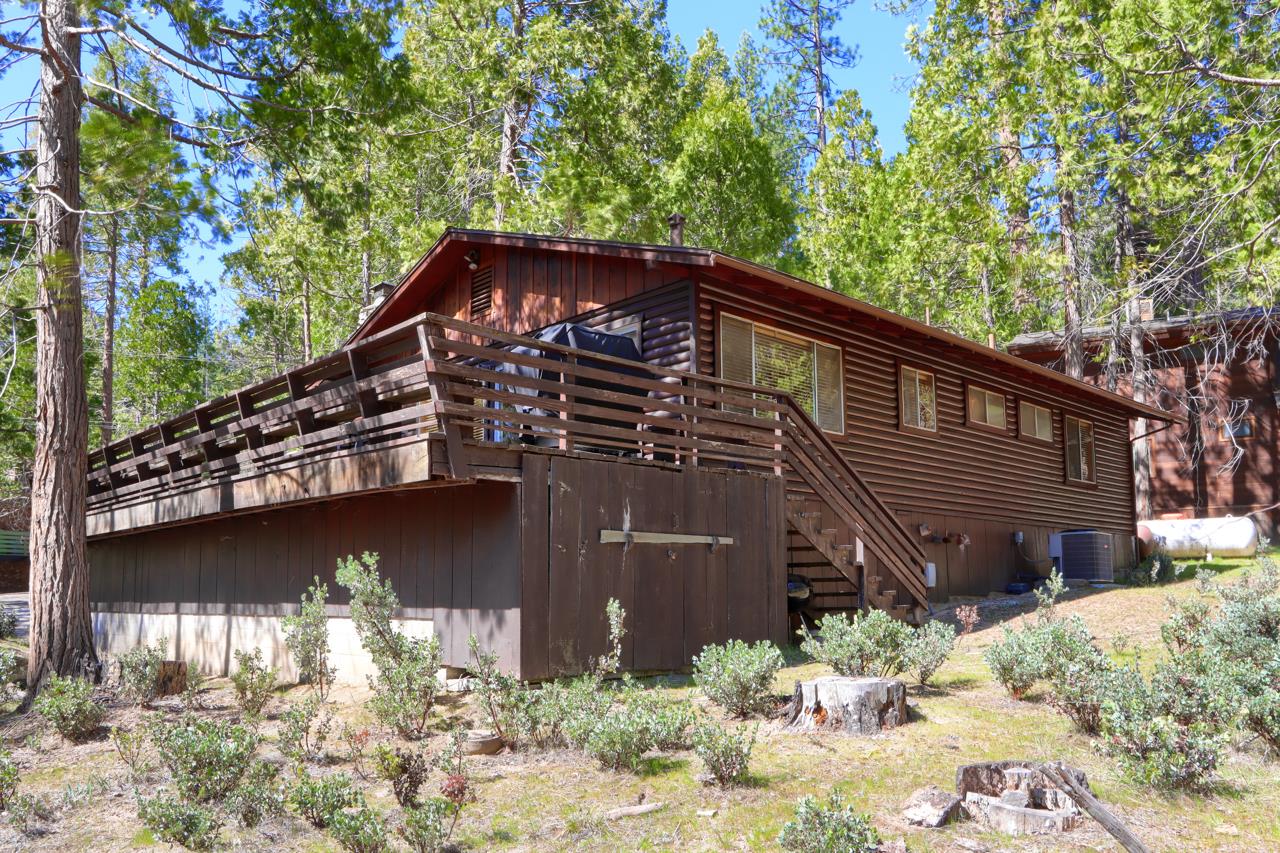 2628 West Bruce Road Wawona, CA 95389 - Photo 25 of 33 a view of a house with a yard next to a road