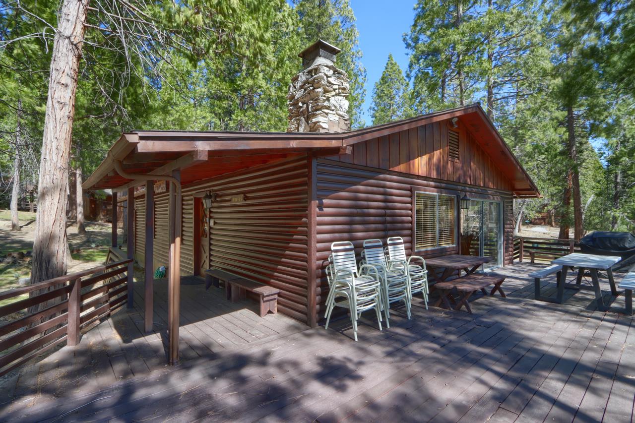 2628 West Bruce Road Wawona, CA 95389 - Photo 3 of 33 a backyard of a house with table and chairs